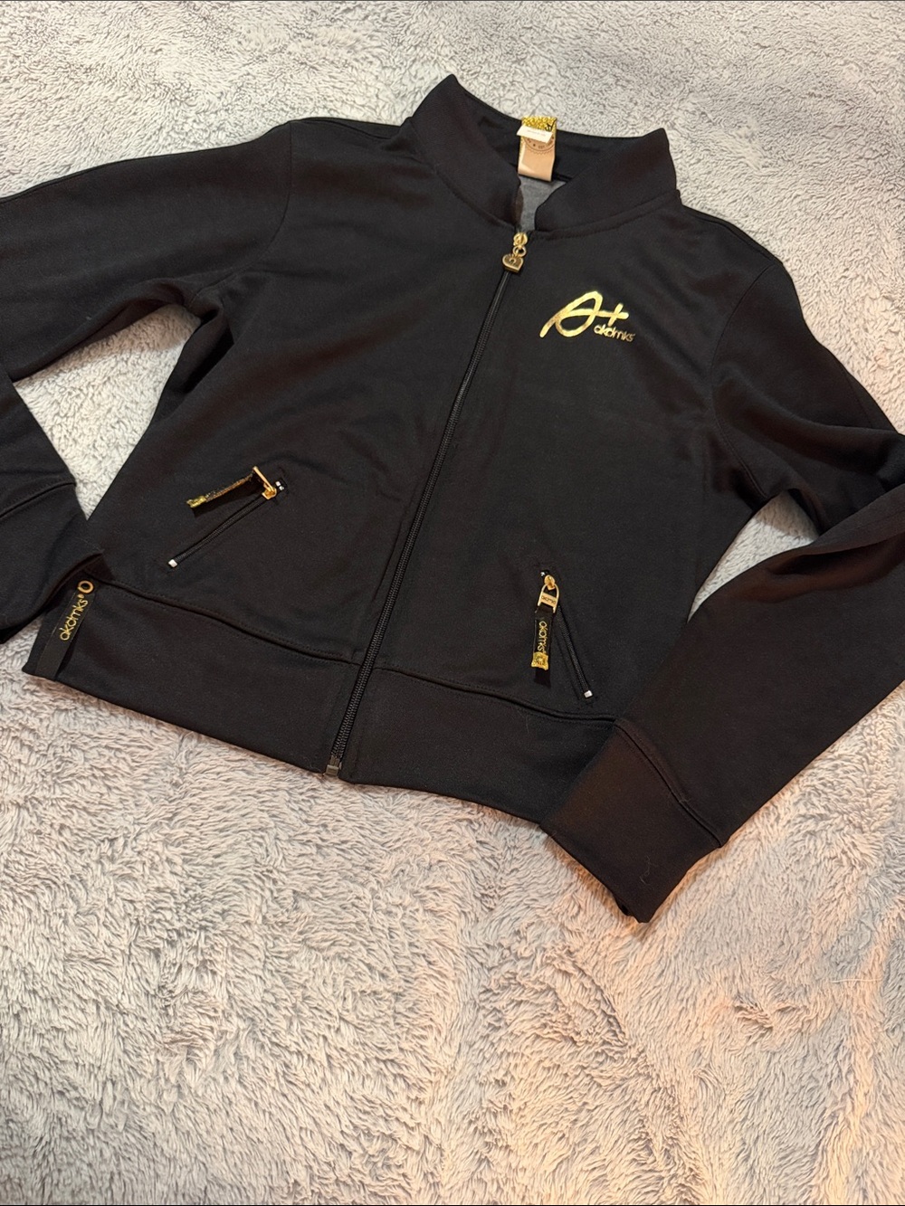 Black Zip-Up Jacket with Gold Accents